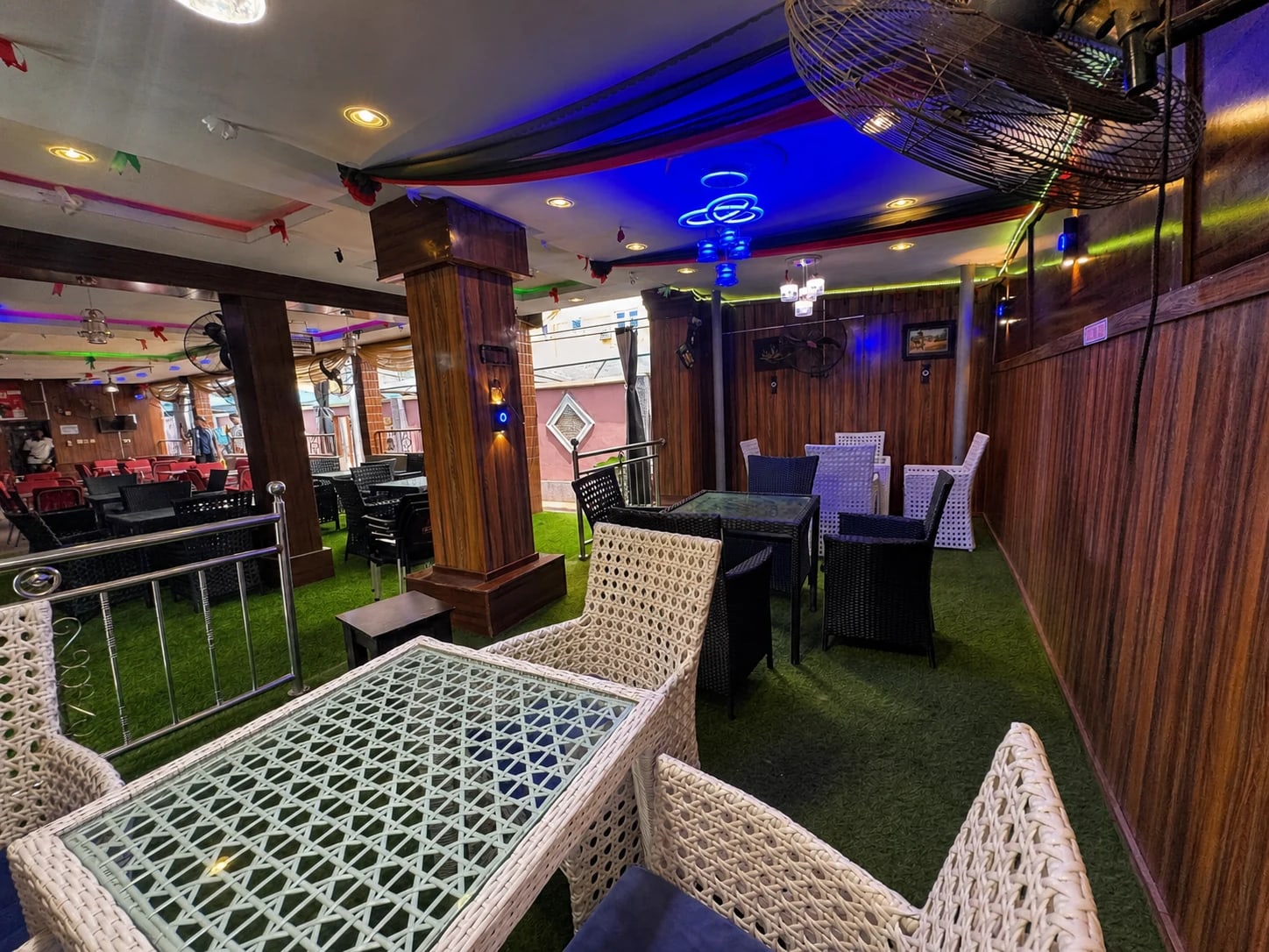 Wood-panelled seating area in Arcadia's Outdoor Lounge