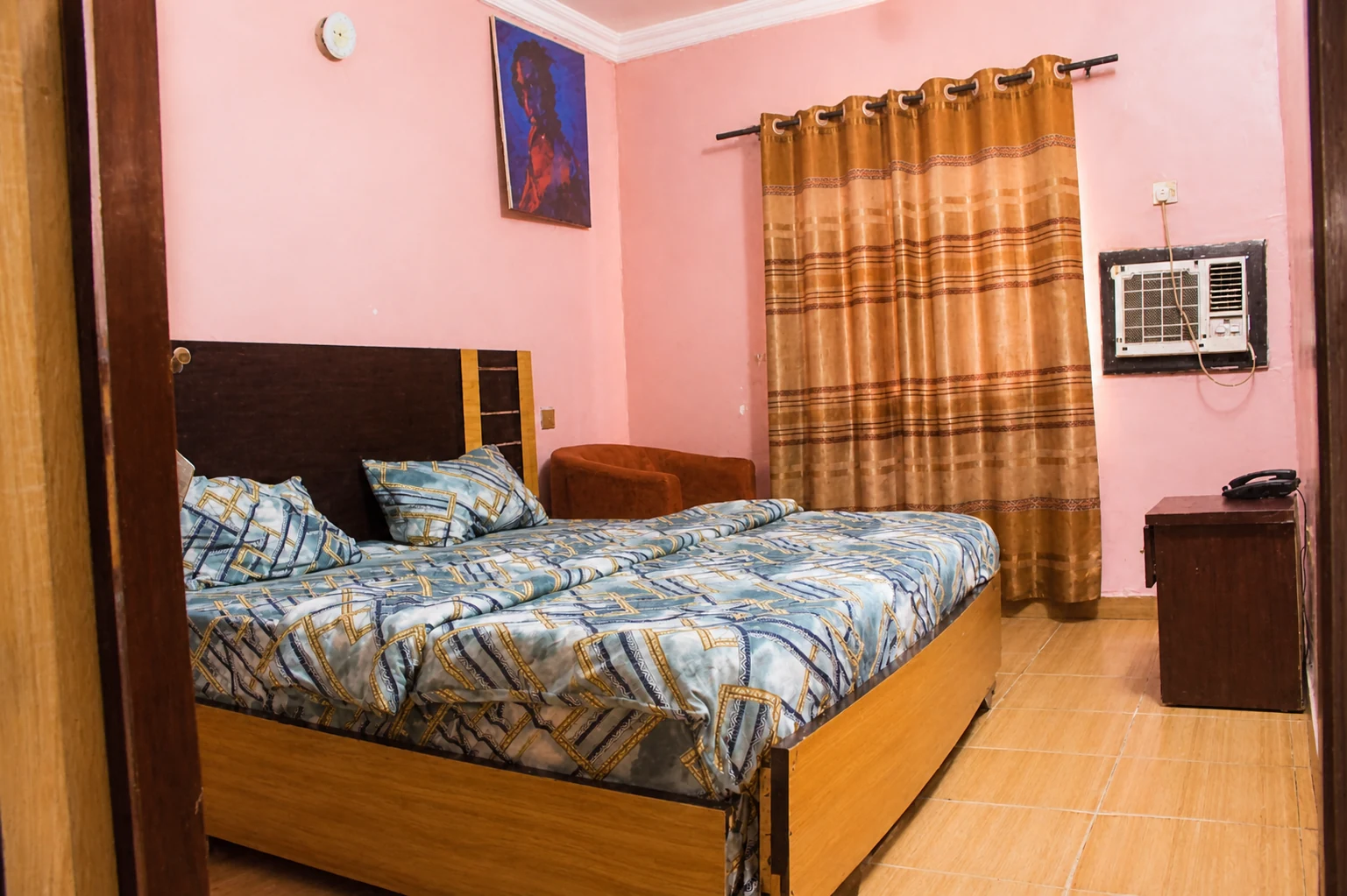 Deluxe bedroom at Arcadia Hotels & Suites