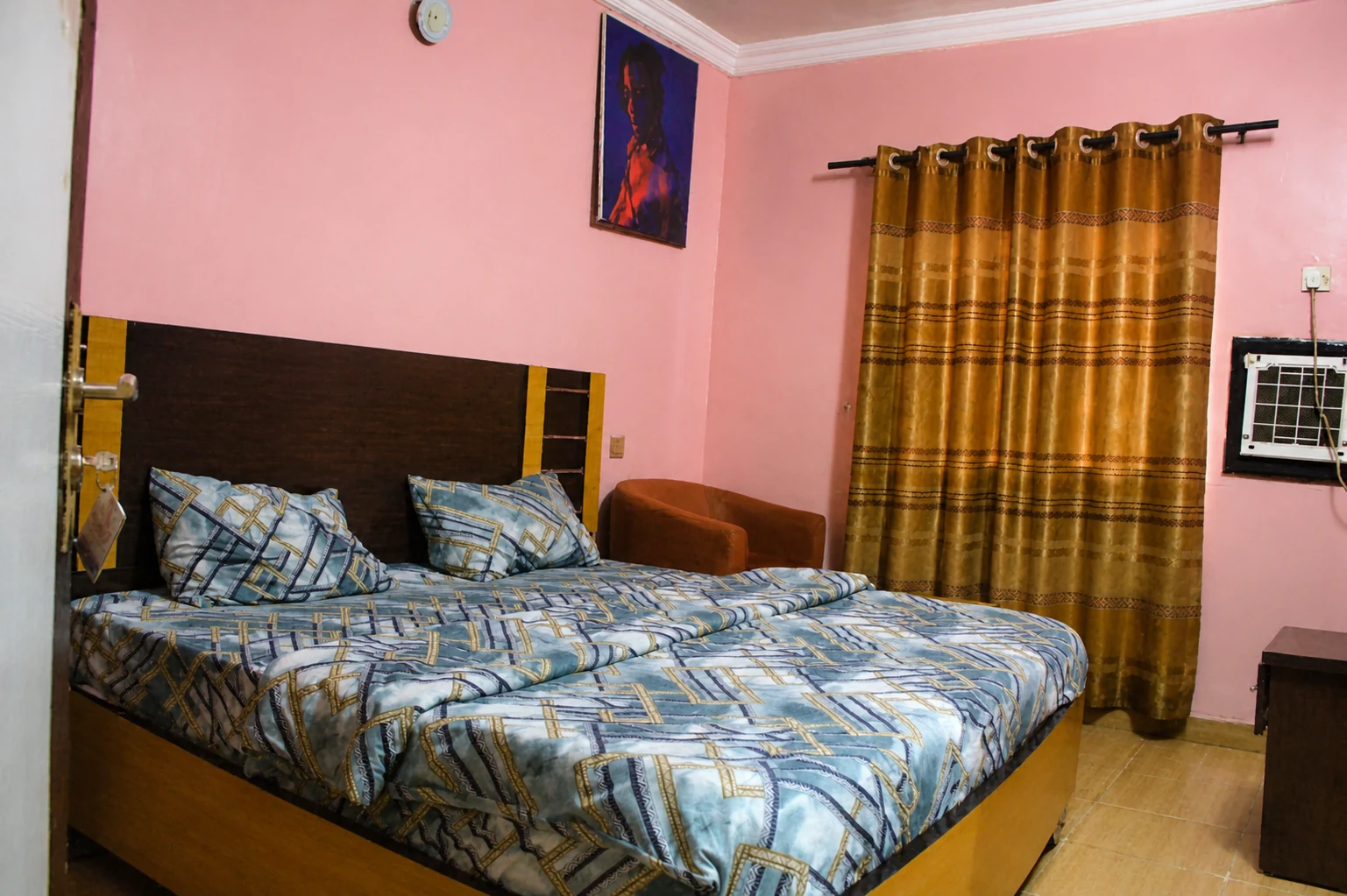 Deluxe bedroom at Arcadia Hotels & Suites