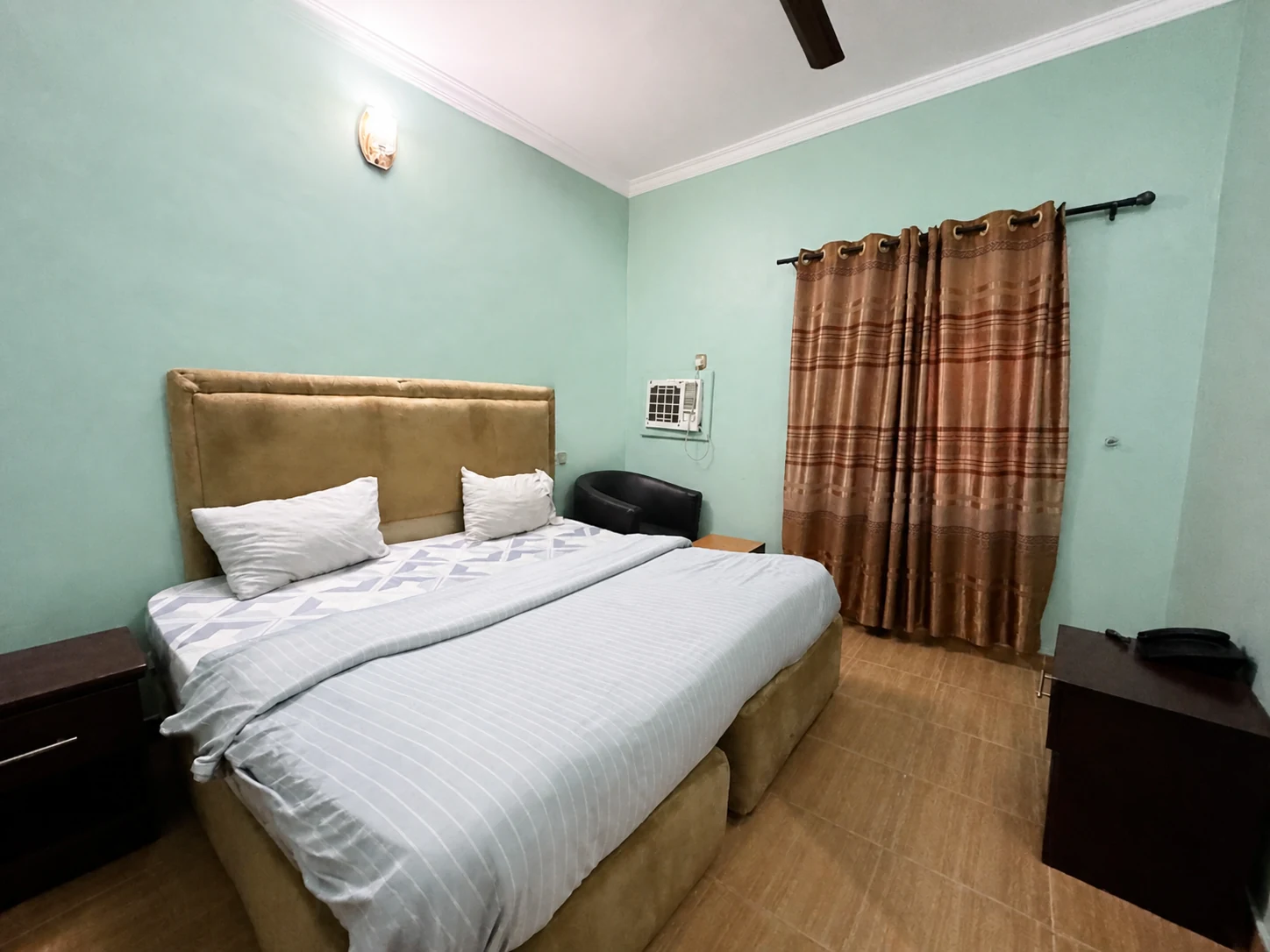 Mini Deluxe bedroom at Arcadia Hotels & Suites