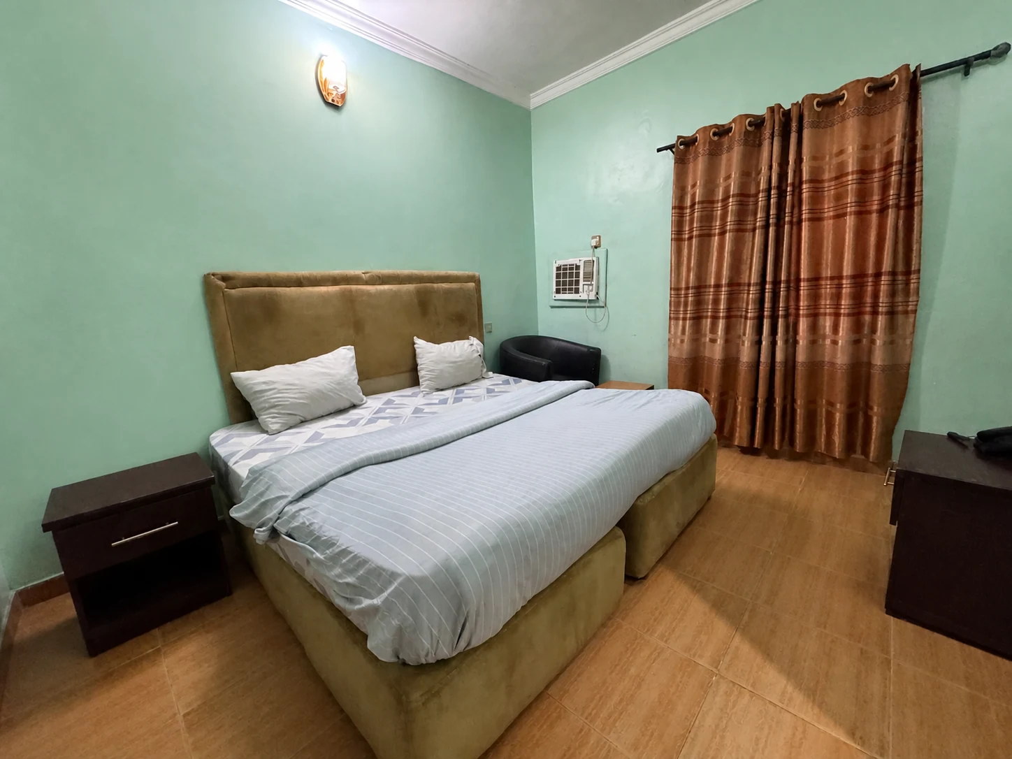 Mini Deluxe bedroom at Arcadia Hotels & Suites